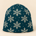 Teal Nordic Snowflake Beanie on a cream studio background