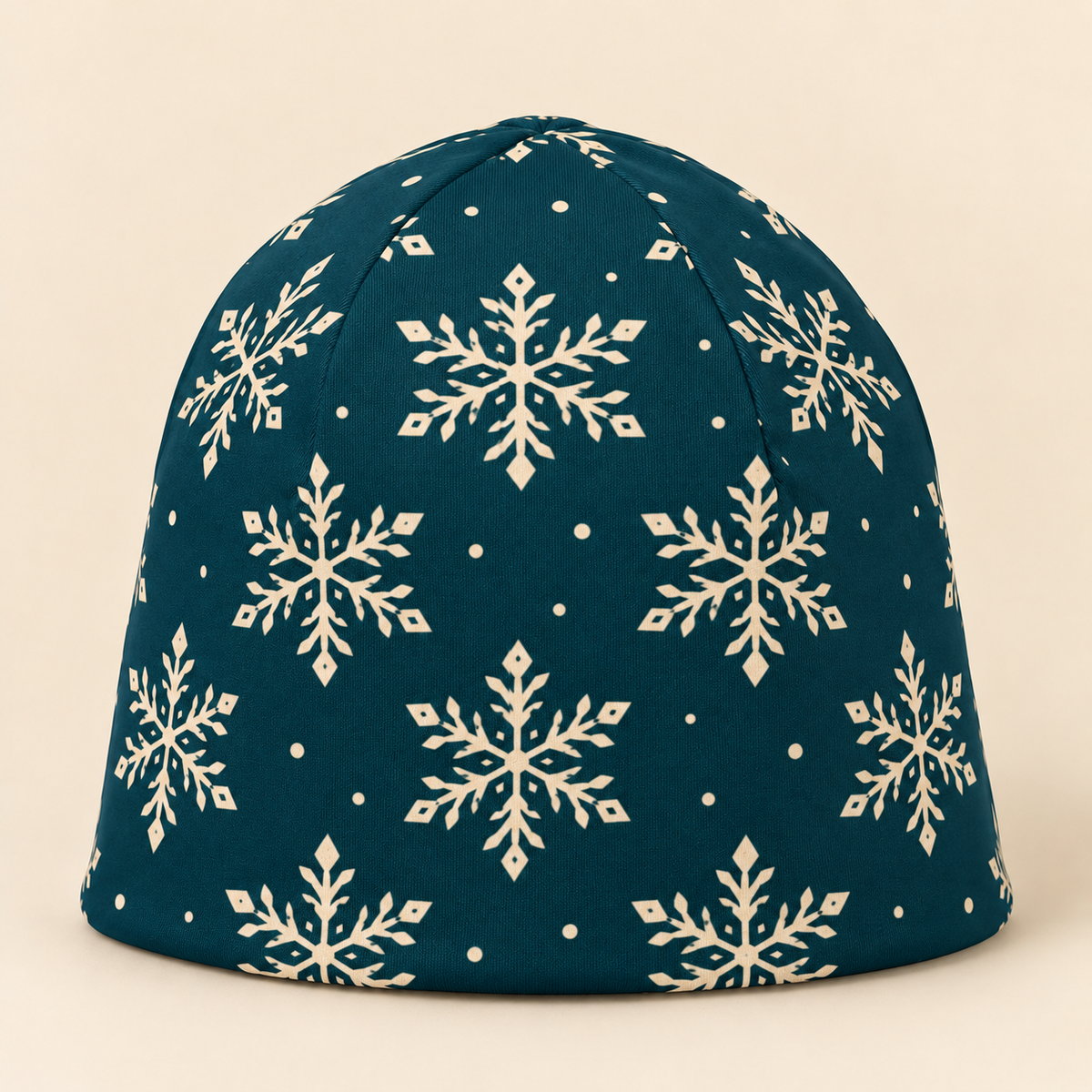 Teal Nordic Snowflake Beanie on a cream studio background