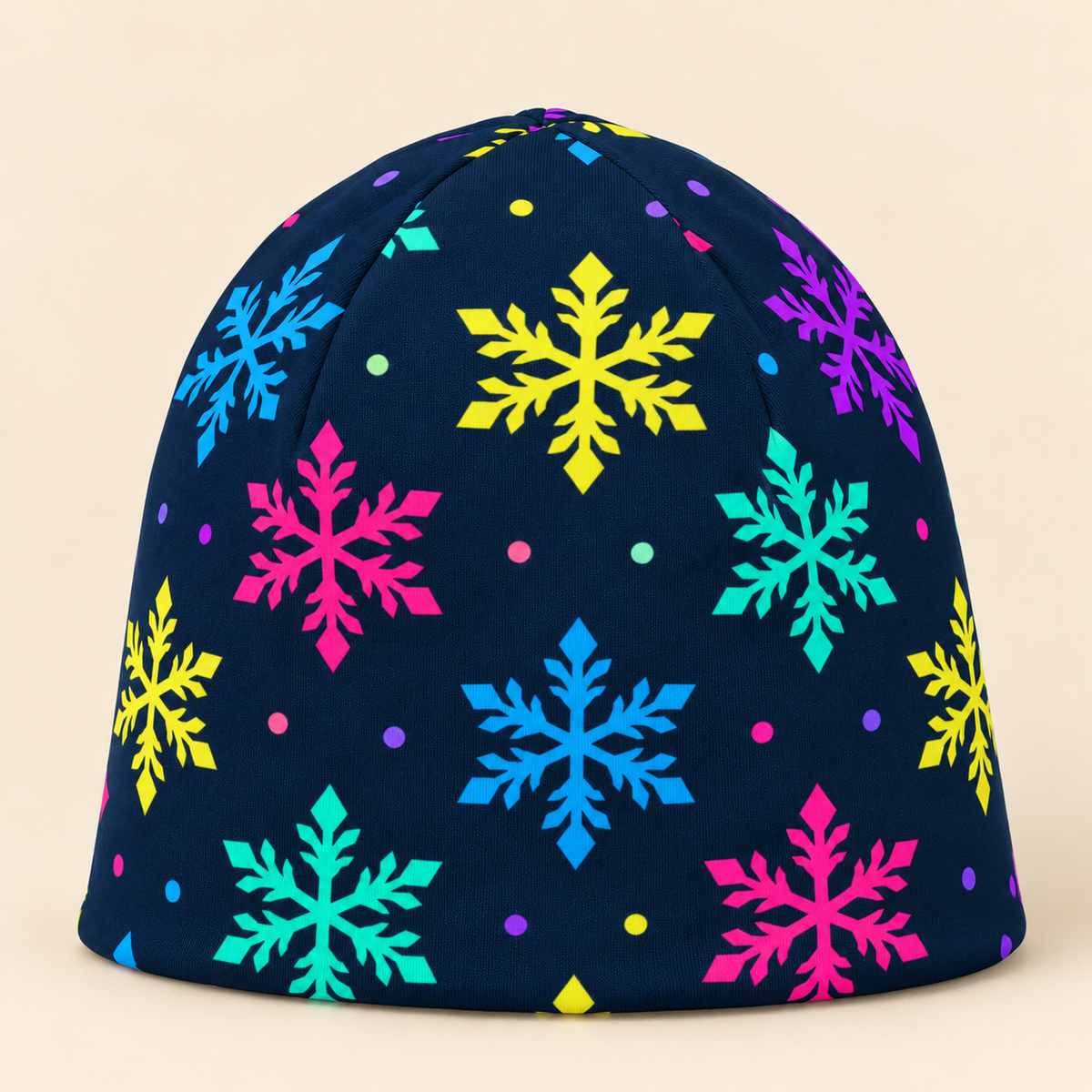 Nordic snowflake beanie on a cream studio background
