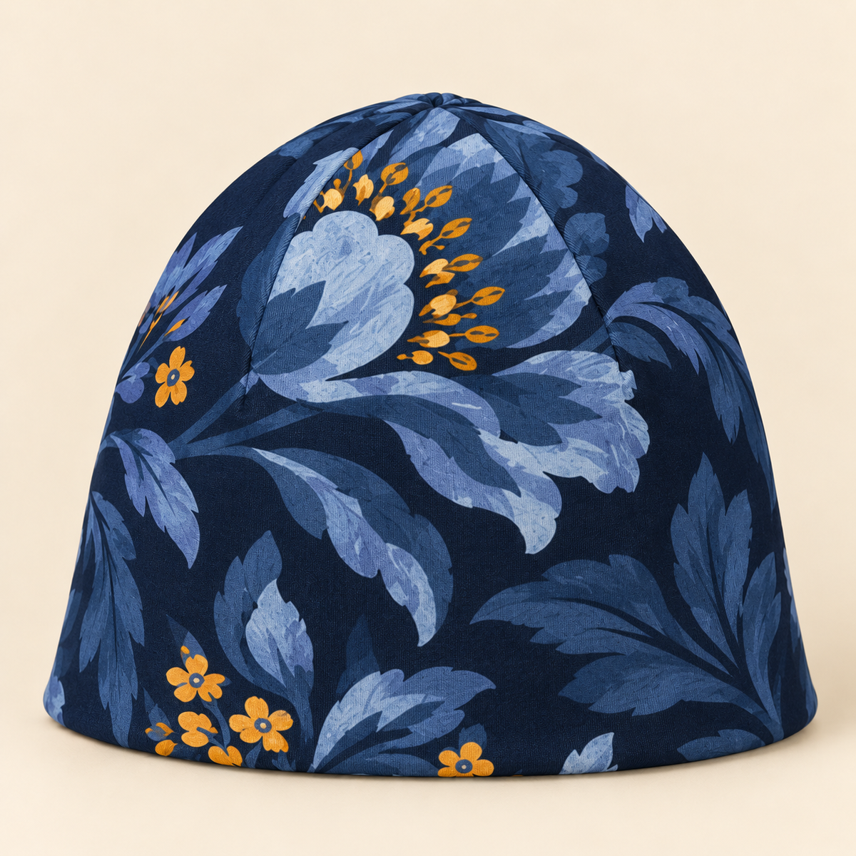 Indigo Botanical Beanie on a cream studio background