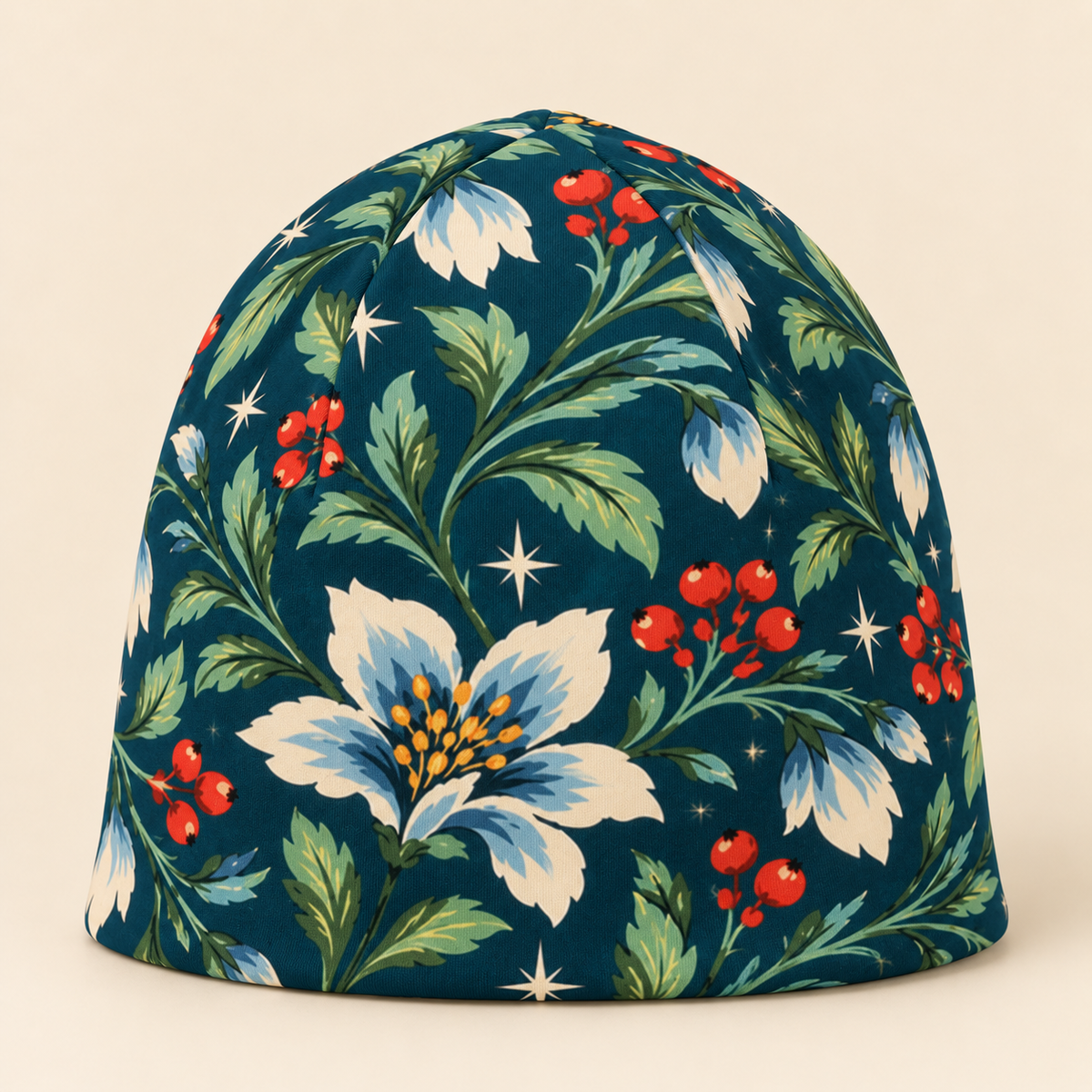 Winter botanical beanie on a cream studio background