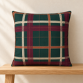 Merlot plaid pillow styled on an oak bench