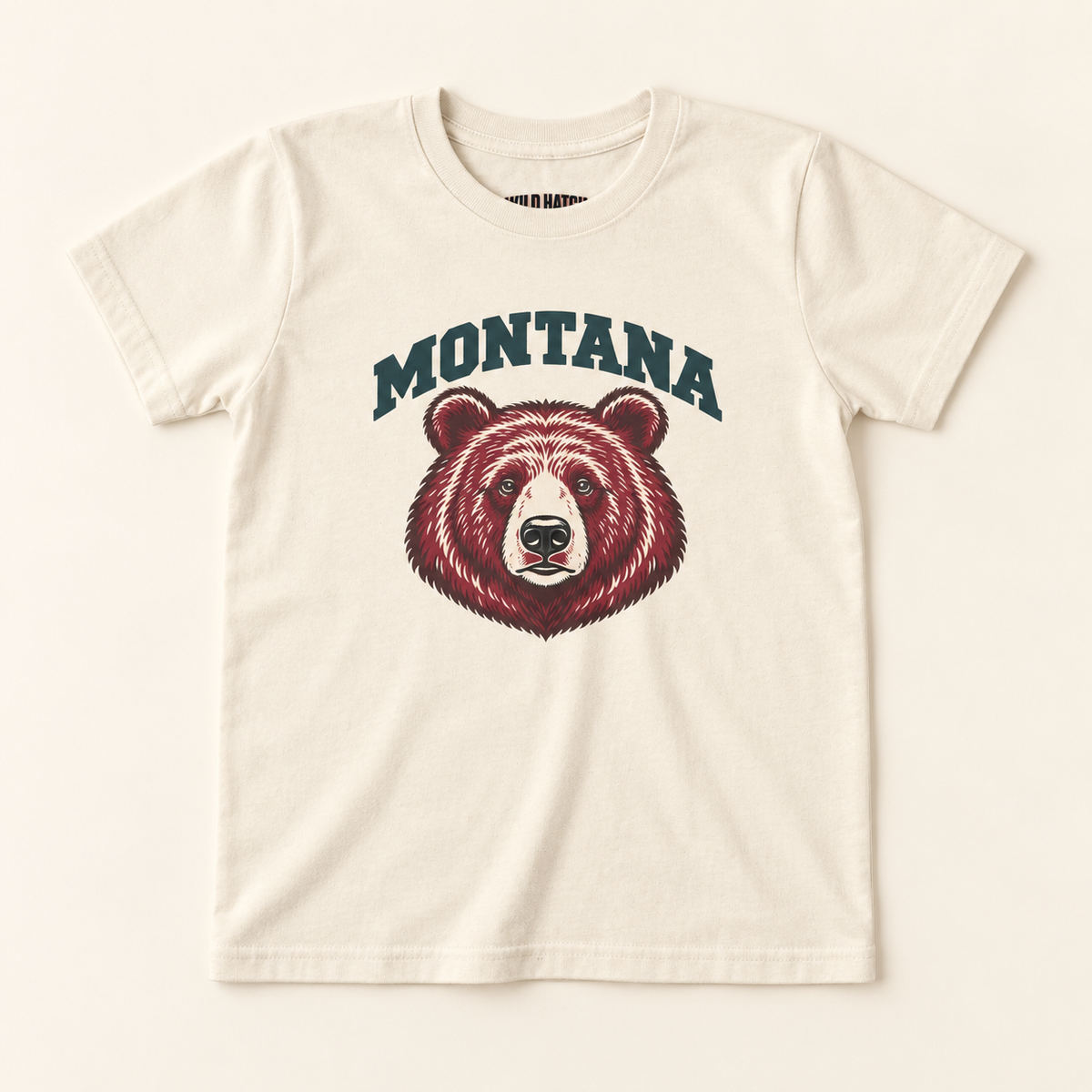 Montana Bear Youth Tee — Natural flat lay mock-up