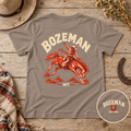 Bozeman Rodeo Women’s Tee — Bucking Bronco Graphic — styled flat lay
