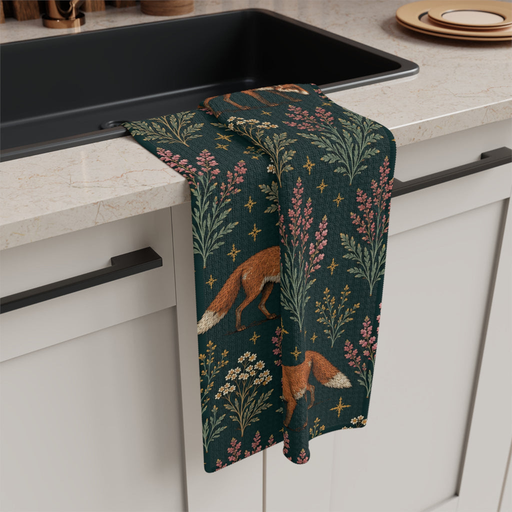 Fox and Heather kitchen towel draped beside a black sink