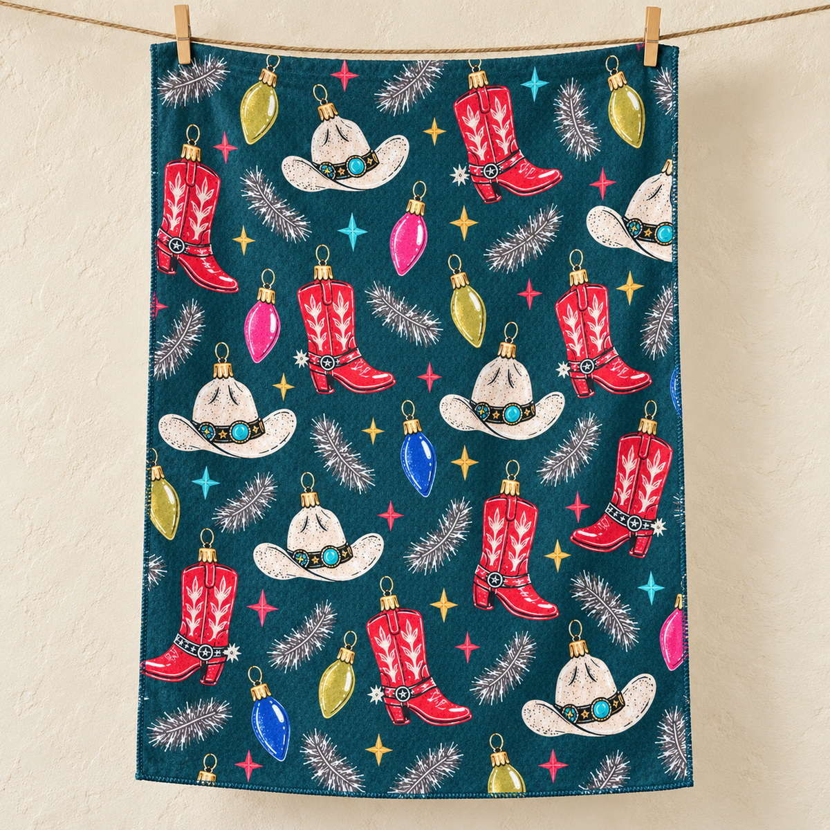 Cowboy Christmas tea towel — hero, subtle waffle texture and matching overlocked edges
