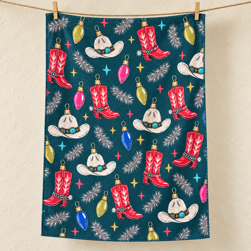 Cowboy Christmas tea towel — hero, subtle waffle texture and matching overlocked edges